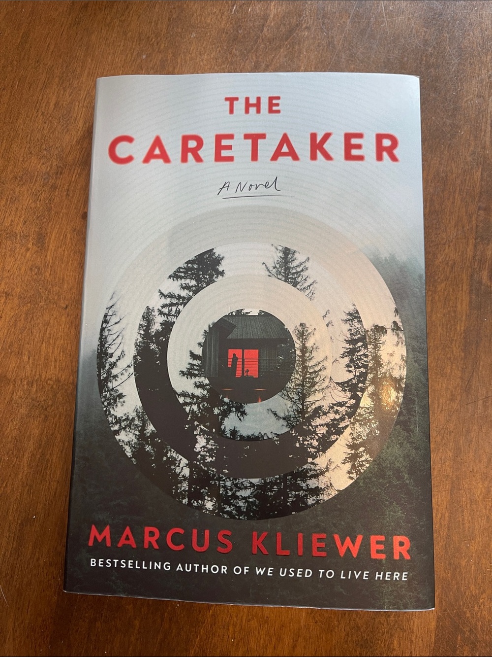 The Caretaker by Marcus Kliewer - Red & Black Paperback